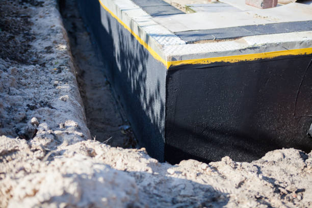 Professional Waterproofing technician working in Campbellsport, WI